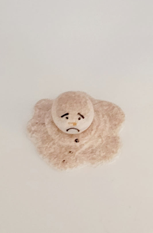 Melted Snowman Figurine