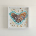Heart‑Shaped Shell Artwork – Framed Coastal Accent
